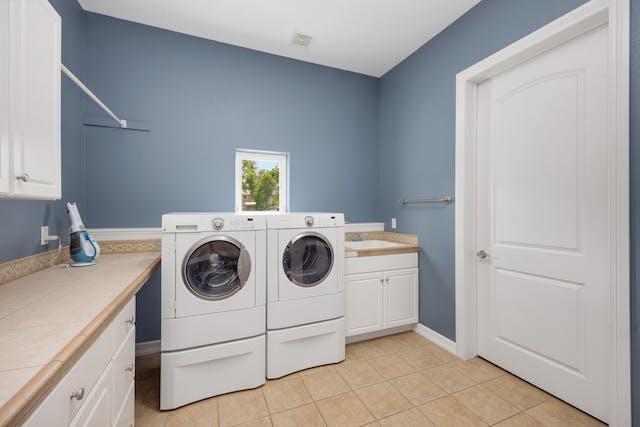 White washing machines in a laundry room